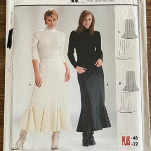 May include: Burda pattern envelope featuring two skirt designs. The envelope includes the number 8406, European sizes, and the text "ROCK JUPE SKIRT FALDA". The image shows two women modeling the skirts, with diagrams of the skirt designs.