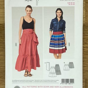May include: Burda Style sewing pattern number 6514 for a skirt. The pattern includes instructions for making a long red skirt with a tie waist and a shorter striped skirt. The pattern is for sizes EUR 36-46 and US 10-20.