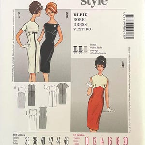 以下が含まれることがあります： ドレス用のBurda Style 7043型紙封筒。表面にはA、B、Cとラベル付けされた3種類のドレスのイラストが描かれており、それぞれ異なる色の組み合わせとネックラインが特徴です。EUR 36-46およびUS 10-20のサイズ表が含まれています。
