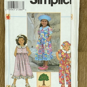 May include: Simplicity sewing pattern with illustrations of children's dresses and a jumpsuit. The pattern includes various styles with floral and plaid designs. The package includes the size AA 2,3,4.