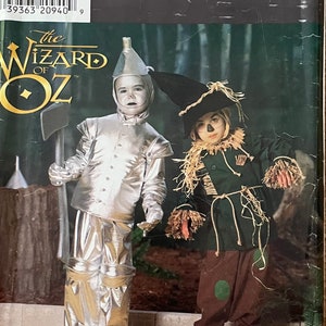 May include: Simplicity Costumes pattern for The Wizard of Oz costumes. The pattern includes instructions for making a Tin Man costume and a Scarecrow costume. The pattern is for sizes 3-8.