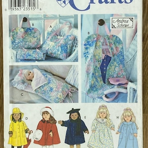 May include: Simplicity Crafts pattern 8962. The image shows a variety of doll clothing and accessories, including a floral print bag, a sleeping bag, and doll outfits. The pattern includes instructions for making a yellow raincoat, a red coat, a blue coat, and dresses.