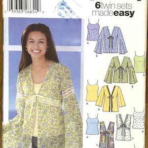 May include: Simplicity pattern 5557 for six twin sets. The image shows a woman wearing a floral jacket with lace trim. The pattern includes various tops and jackets. Measurements are given in sizes 4, 6, 8, and 10.