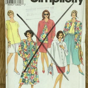 May include: Simplicity sewing pattern featuring illustrations of women's clothing designs. The pattern includes a variety of outfits, such as jackets, skirts, and blouses. The size is FF (18W-24W).