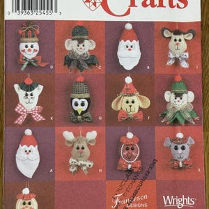 May include: A Simplicity Crafts pattern for making felt Christmas ornaments. The designs include a snowman, Santa, reindeer, penguin, and gingerbread man. The pattern is one size and features "Francesca Designs."