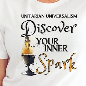 May include: White t-shirt with the text "UNITARIAN UNIVERSALISM Discover Your Inner Spark" in black and gold lettering. A stylized image of a chalice with a flame rising from it is in the center of the shirt.
