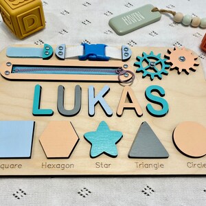 Custom made puzzle name Montessori busy board for toddlers Made in USA will help your toddler to improve problem solving, Montessori toys is wooden toy and perfect birthday gift for your girl or boy toddler, Christmas gift, 1st birthday gift.