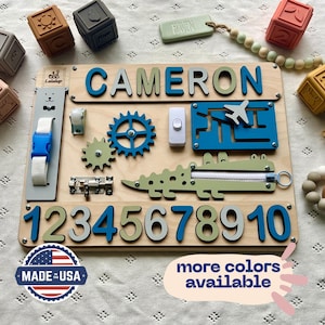 Educational Montessori busy board for toddlers with personalized puzzle name, shoe Velcro, shoe with lace, maze, zipper training, fun wheels, buckle opening and closing exercise, lock, switch and fun wheel. This busy board will keep your child busy.