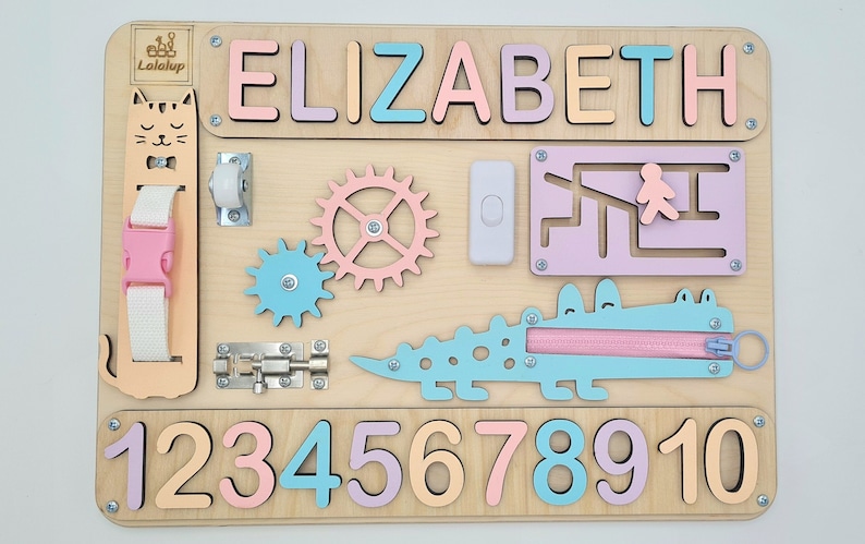 Educational Montessori busy board for toddlers with personalized puzzle name, shoe Velcro, shoe with lace, maze, zipper training, fun wheels, buckle opening and closing exercise, lock, switch and fun wheel. This busy board will keep your child busy.