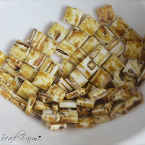 5mm Miyuki Tila Beads - Canary Yellow Picasso #4512. 7.2 gram tube