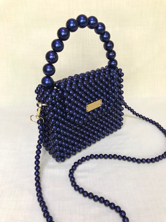 Pearl bag designer hotsell