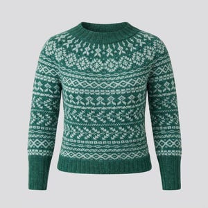 May include: A green sweater with a white geometric pattern. The sweater has a crew neck and long sleeves with ribbed cuffs. The pattern includes diamond and snowflake-like shapes. The sweater is made of a soft, knitted material.