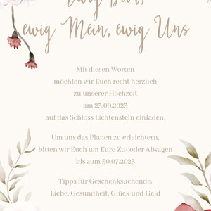 May include: A wedding invitation with floral accents in shades of pink and white. The text reads "Ewig Dein, ewig Mein, ewig Uns" and includes the date "23.09.2023" and the location "Schloss Lichtenstein".