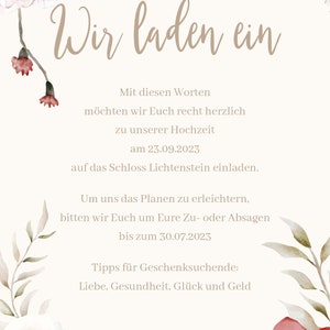 May include: A wedding invitation with floral accents in shades of pink and white. The text reads "Wir laden ein" which translates to "We invite you". The invitation details a wedding on September 23, 2023, at Schloss Lichtenstein. The names Jule & Konstantin are at the bottom of the invitation.