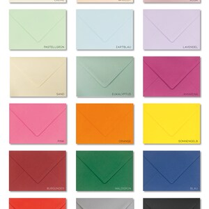 May include: A chart of 16 different colored envelopes, with the color name written below each envelope. The colors include cream, apricot, rosa, pastel green, light blue, lavender, sand, eucalyptus, amarena, pink, orange, yellow, burgundy, forest green, blue, red, light gray, and black. The text at the bottom of the chart reads "WEITERE FARBEN AUF ANFRAGE".