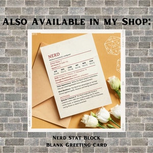 May include: A blank greeting card with a beige background and a white rose. The card features a character stat block for a "Nerd" character with the text "NERD STAT BLOCK BLANK GREETING CARD" printed at the bottom.