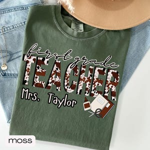 Personalized First Grade Teacher Shirt, Teacher Appreciation Gift, Custom Cow Print Teacher Back to School Clothing, Western Teacher Name