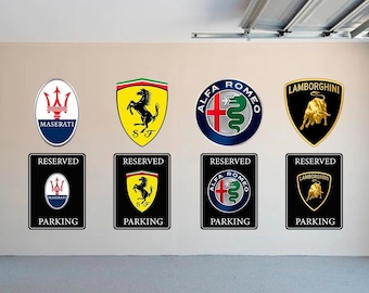 May include: Wall art featuring the logos of Maserati, Ferrari, Alfa Romeo, and Lamborghini. Below each logo is a matching sign that reads "RESERVED PARKING". The logos are in their respective colors and designs.