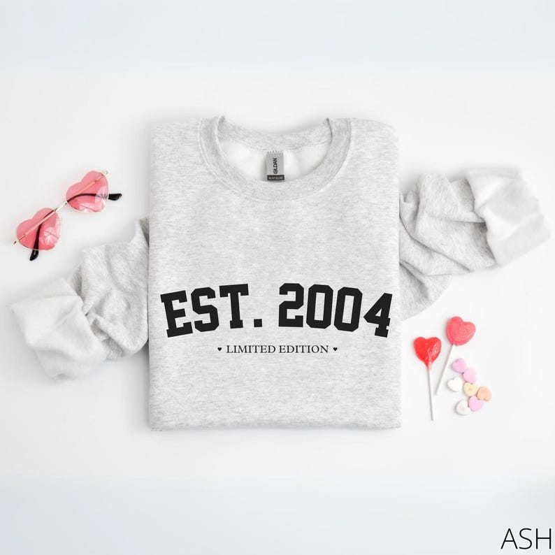 May include: Grey sweatshirt with the text "EST. 2004" in black, with the words "LIMITED EDITION" underneath.