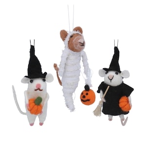 May include: Three Halloween-themed felt mice ornaments. One mouse is dressed as a mummy, another as a witch with a black hat and broom, and the third mouse is holding a pumpkin. Each mouse has a string for hanging.