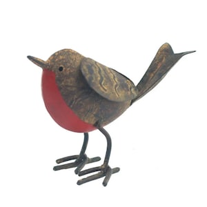 May include: A metal robin figurine with a red breast, brown and gold wings, and black wire legs.