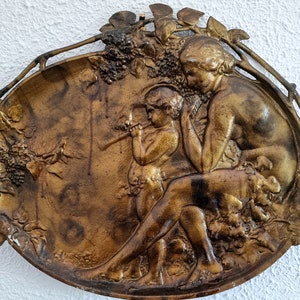 Mythological scene in relief