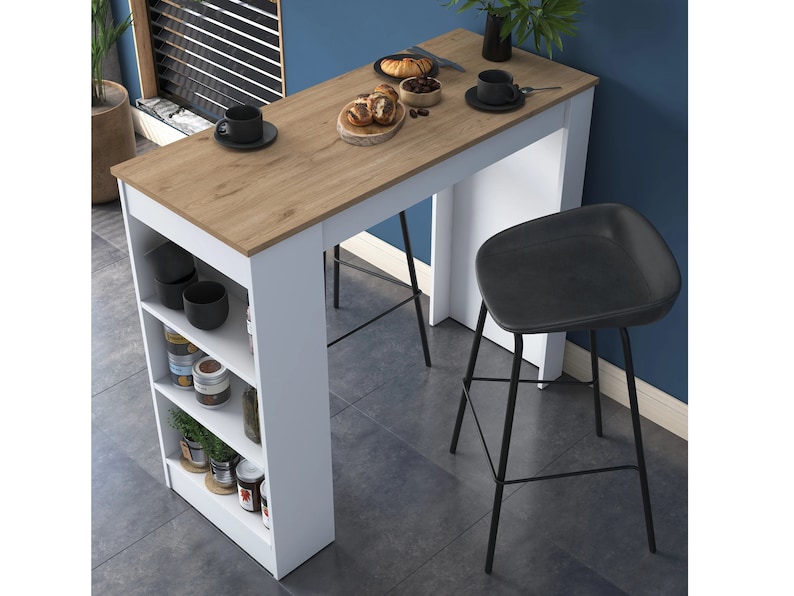 May include: A white kitchen island with a wood countertop and three shelves. The island has a black metal bar stool with a black leather seat.