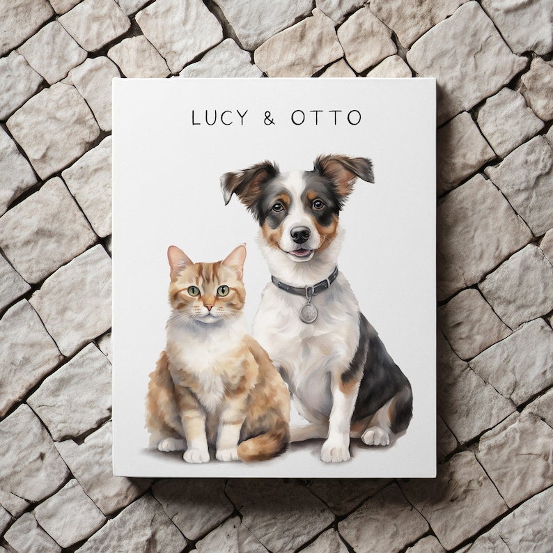 May include: A white canvas print with a watercolor illustration of a brown and white dog and a brown and orange cat. The dog is sitting with its head tilted and its mouth closed. The cat is sitting with its head straight and its mouth closed. The text "LUCY & OTTO" is printed at the top of the canvas.