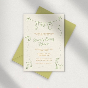 May include: A green and white baby shower invitation with a line of clothes hanging on a string. The invitation reads "Jenna's Baby Shower" and includes the date, time, location, and RSVP information.