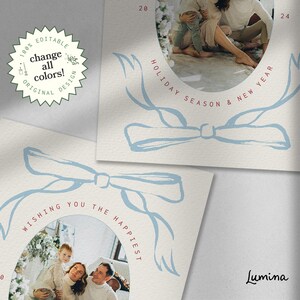 May include: A holiday card template with a blue ribbon design and a circular space for a photo. The text "Wishing you the happiest Holiday Season & New Year" is written around the ribbon design. The text "Lumina" is in the bottom right corner.