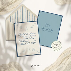 May include: A blue and white striped envelope with a white card that says "Rachel & Simon are getting married in San Diego, California on March 11 2026". A blue card with a white swan and the text "Save the Date 03. 11. 2026" is on top of the envelope.