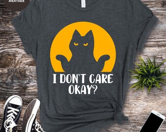 Grappig T-shirt met schouderophalende kat: maakt mij niet uit, oké?