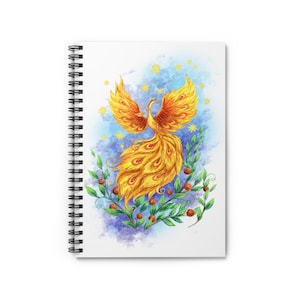 May include: Spiral-bound notebook featuring a vibrant illustration of a golden phoenix with outstretched wings. The artwork includes a blue and purple watercolor background with yellow stars, and green foliage with red berries. The notebook has a white cover.