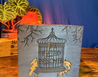 The complete Plated Prisioner series  papery book set with handmade wood display chest