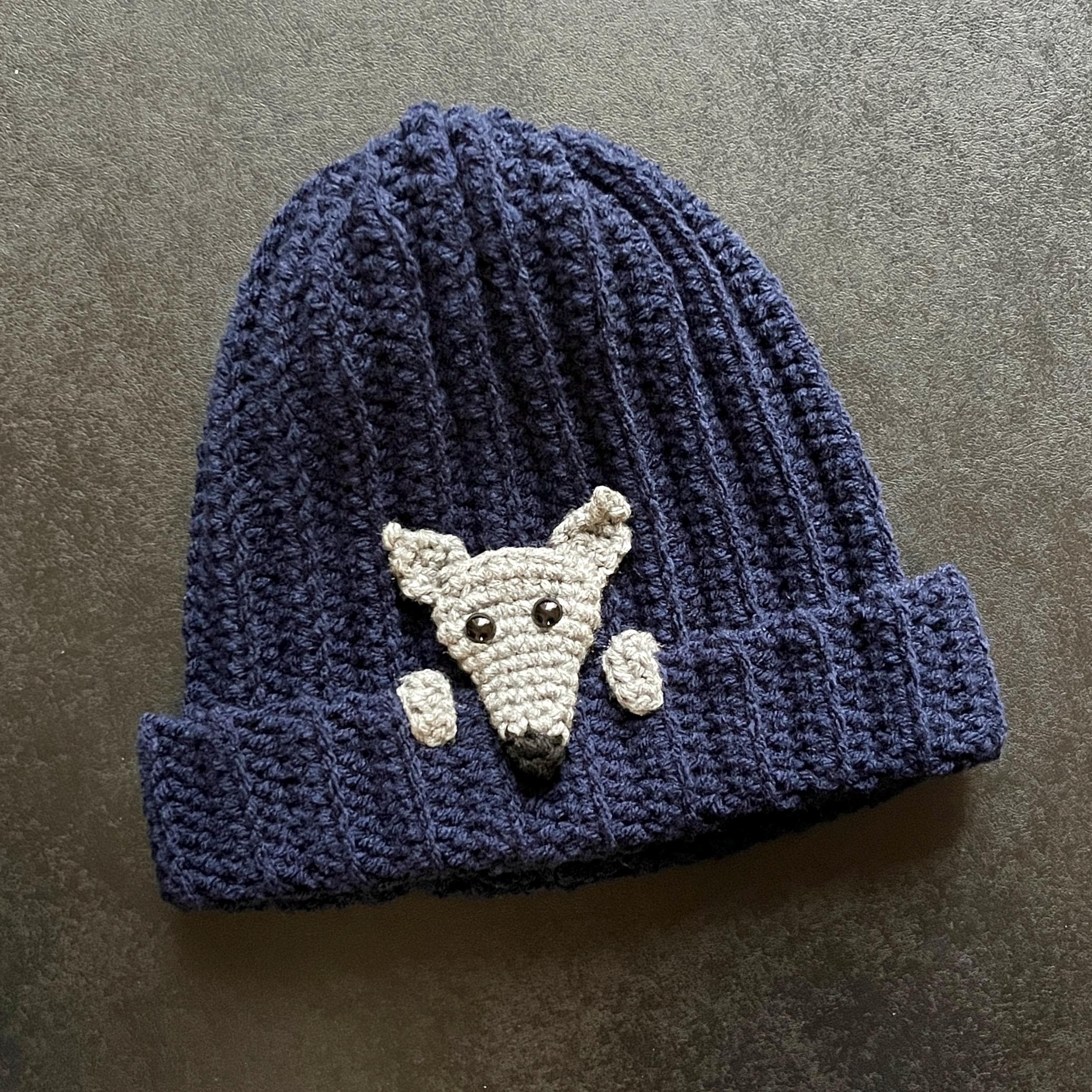 39 Dog Hat Crochet Patterns to Make for Photos, Gifts, and Festive Dress-Up 29 Greyhound Dog Peek-a-boo Hat Crochet