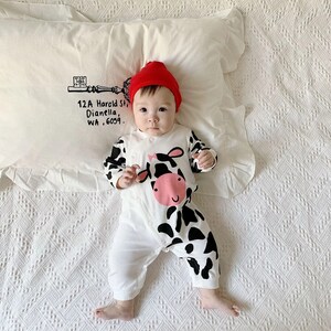 Pelele para bebé de Baby Moo's, diseño de vaca; disfraz de bebé