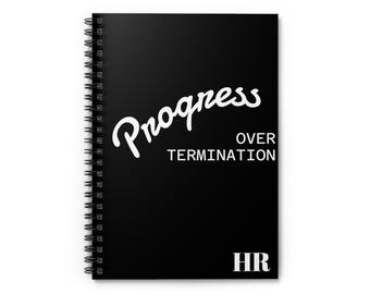 May include: Black spiral-bound notebook with the words "Progress Over Termination" in white script. The letters "HR" are at the bottom. The notebook is designed for note-taking and organization.