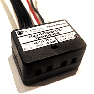 May include: A black Mini differential thermostat with white text, including the brand name Deselectro and the website deselectra.com. The thermostat is a solar pump controller with a temperature range of 10-90C.