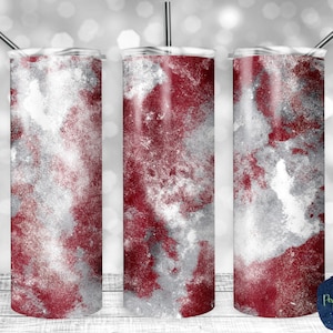 May include: Three stainless steel tumblers with a red and silver marbled design. The tumblers are 20 ounces each.