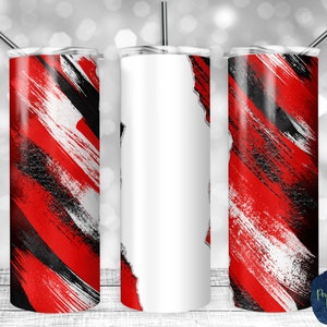 Puede incluir: Tres vasos de acero inoxidable con un diseño de pintura abstracta rojo, negro y blanco. El vaso del centro está en blanco.