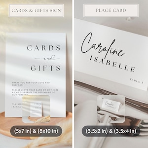 May include: Two white wedding signs. One reads "CARDS and GIFTS" with a smaller card replica. The other is a place card with the name "Caroline Isabelle" and table number 5. Sizes are 5x7 in, 8x10 in, 3.5x2 in, and 3.5x4 in.