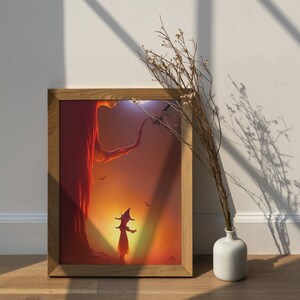 May include: A framed illustration of a young witch standing in front of a large tree with bats flying overhead. The background is a sunset with orange and red hues.