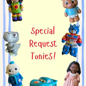 May include: A collection of seven small character figurines surrounding the red text Special Request Tonies! The figures include a girl with pigtails, a brown bear, a grey dinosaur, a blue robot, a child in blue pyjamas, a blue race car, and a girl in a pink dress.