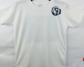 May include: A white short-sleeved t-shirt featuring a black circular graphic on the upper left chest. The graphic depicts a silhouette of a person fishing with a rod and line, capturing a large fish jumping out of the water within a circular border.