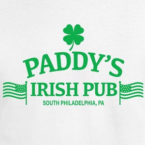 May include: White t-shirt with a green shamrock and the text "Paddy's Irish Pub" in green. Below the text is "South Philadelphia, PA" in smaller green text.