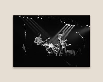 Dire Straits in concert, Communique Tour, 1979. Restored vintage black and white photo. Museum quality print.