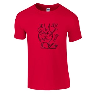 May include: A bright red t-shirt featuring a black cartoon cat design. The cat has an angry expression, with sharp ears and a tail. The graphic is hand-drawn, giving it a unique, artistic look. The shirt is made of a soft material.