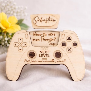 A surprise godfather proposal in the shape of a wooden game controller, to ask the most beautiful question: Will you be my godfather?