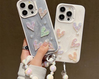 Étui bling pour iPhone 15 14 13 12 11 Pro Max, étui de téléphone avec cordon de perles, coques de téléphone uniques en cristal pour filles/dames, coque Love peach