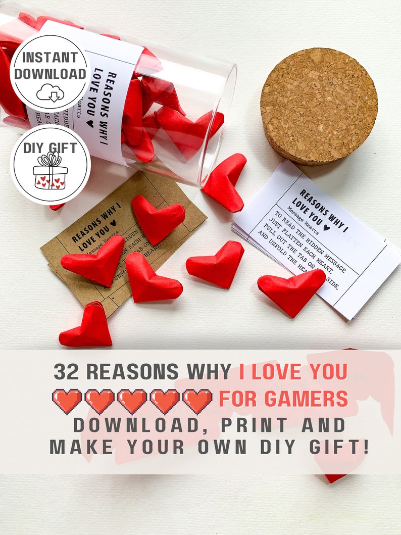 May include: Printable DIY gift for gamers. 32 red paper hearts with messages inside a glass jar. The hearts are folded into origami shapes. The text on the hearts reads "Reasons why I love you".